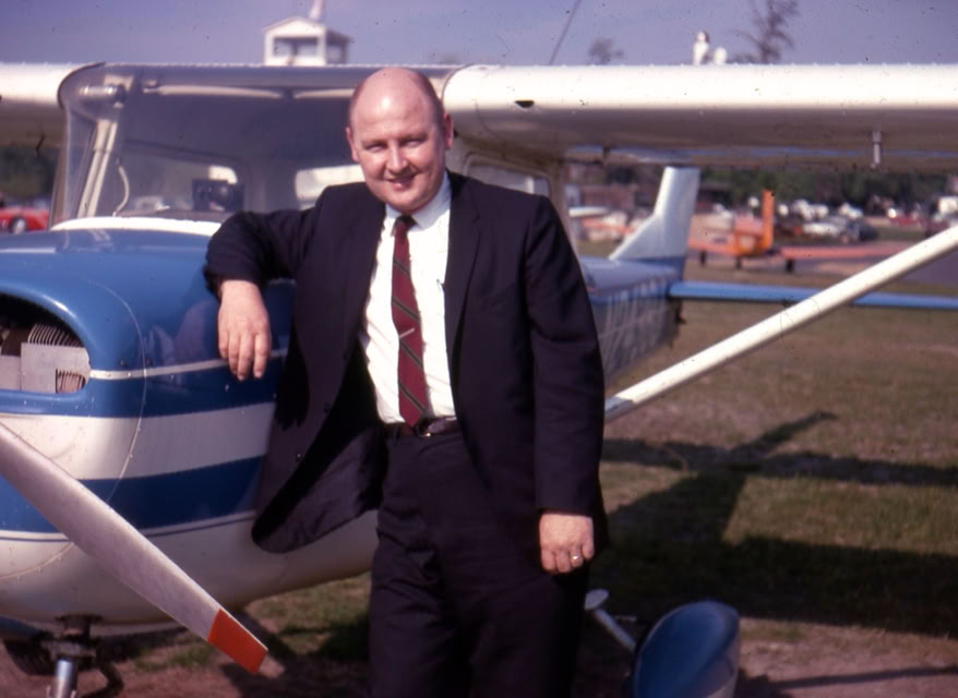Jesse Dilday (Mike's Father) standing in front of one of the aircraft he flew.  This was a 2 place cessna.  Not sure where this was taken or when.
